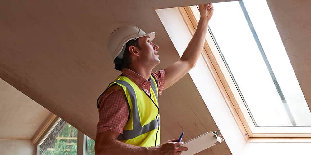 Man in hard hat and high visibility vest